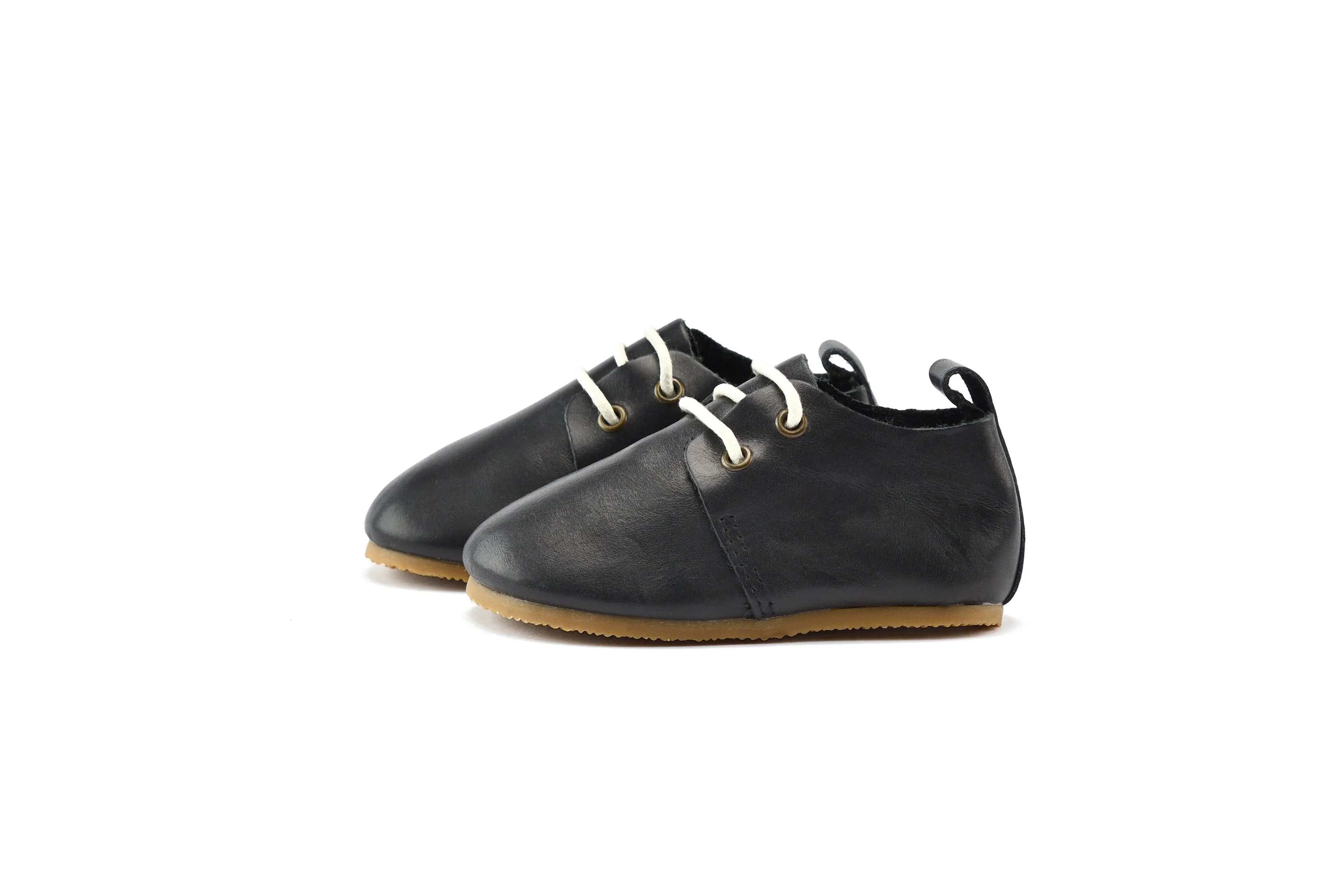 Black Oxford shoes with low top and hard sole