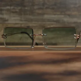 Green Lens Rectangle Frame Sunglasses with Gold Frame.