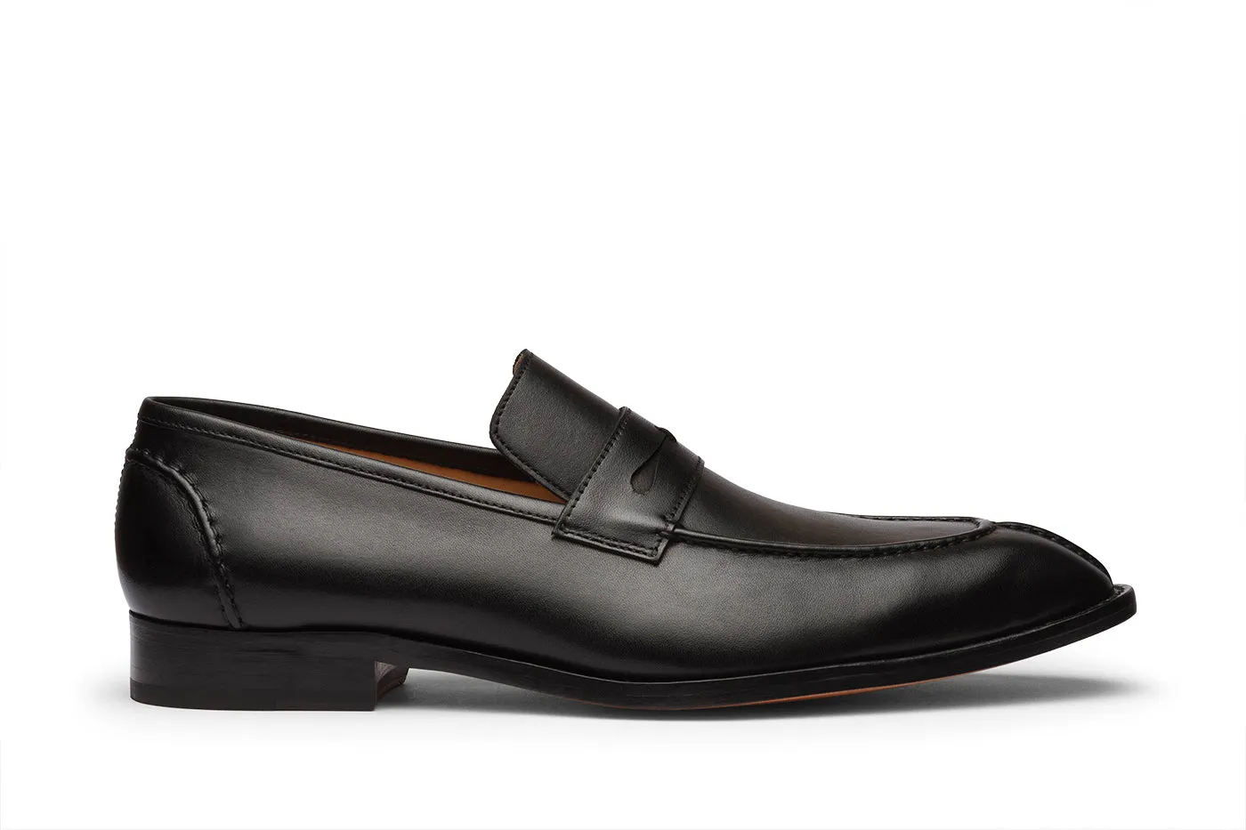 Penny loafer featuring hand cording on the vamp, toe, and back counter.