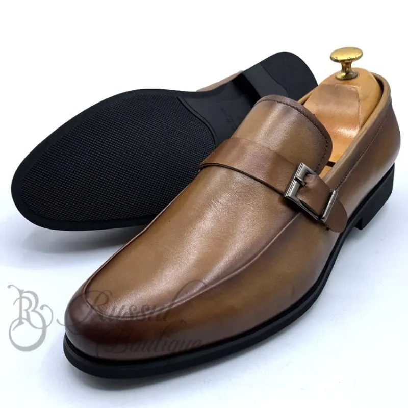 Robert Wood brown leather loafers with side buckle.