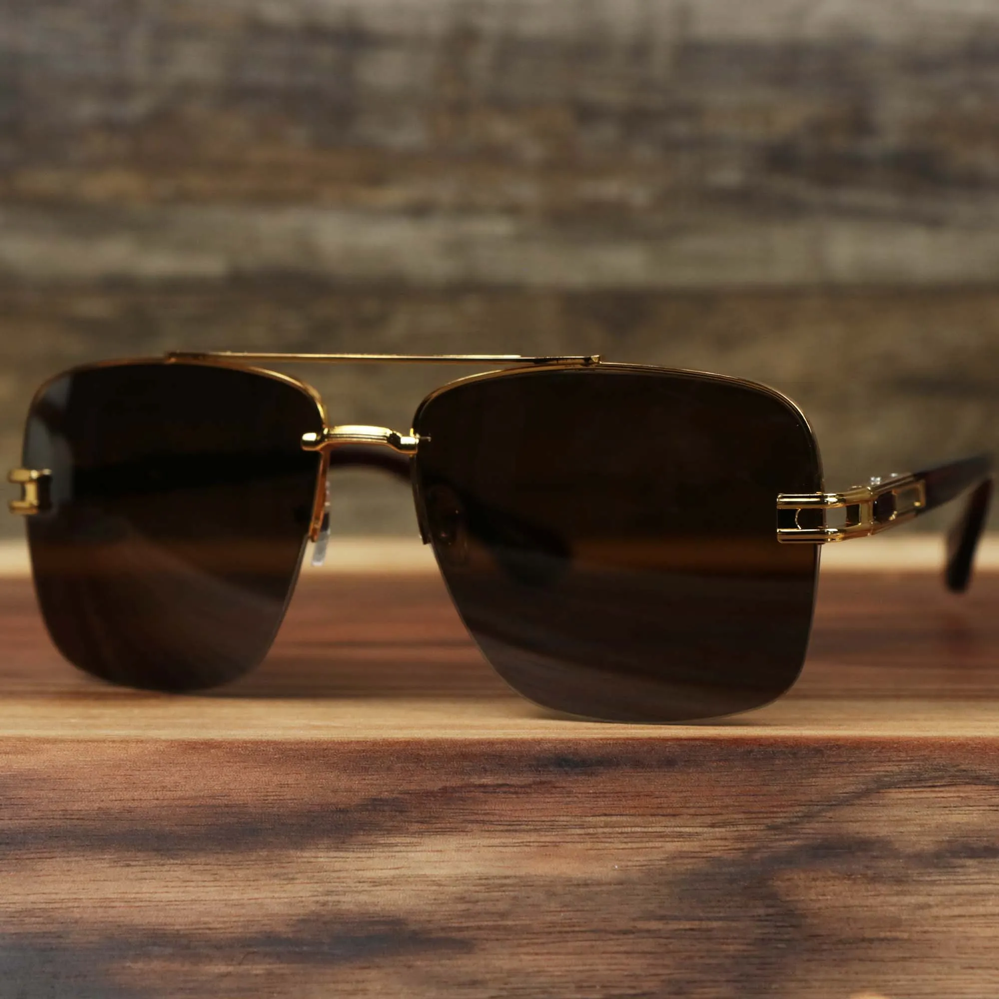 Round Brown Lens Sunglasses with Gold Frame.