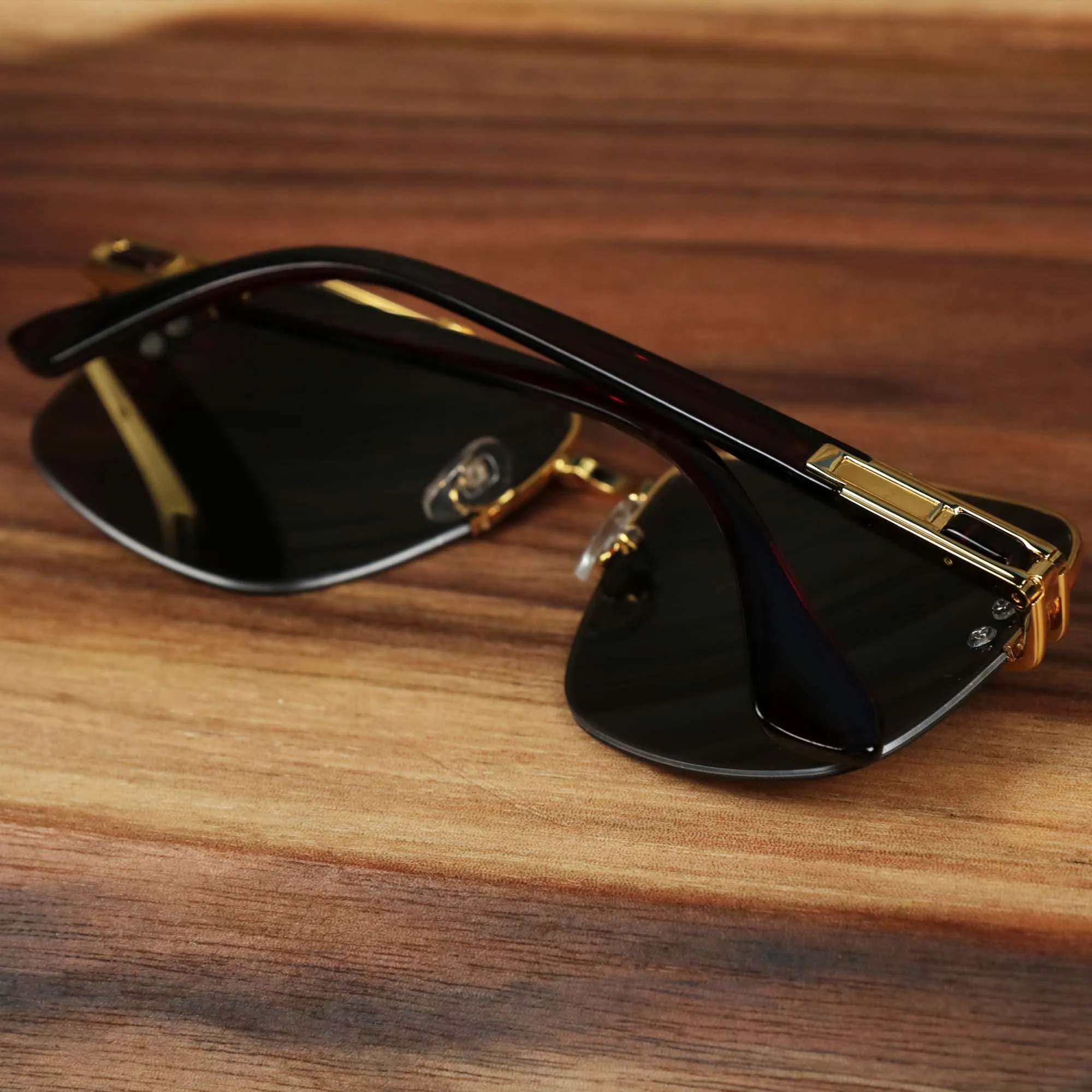 Round Brown Lens Sunglasses with Gold Frame.