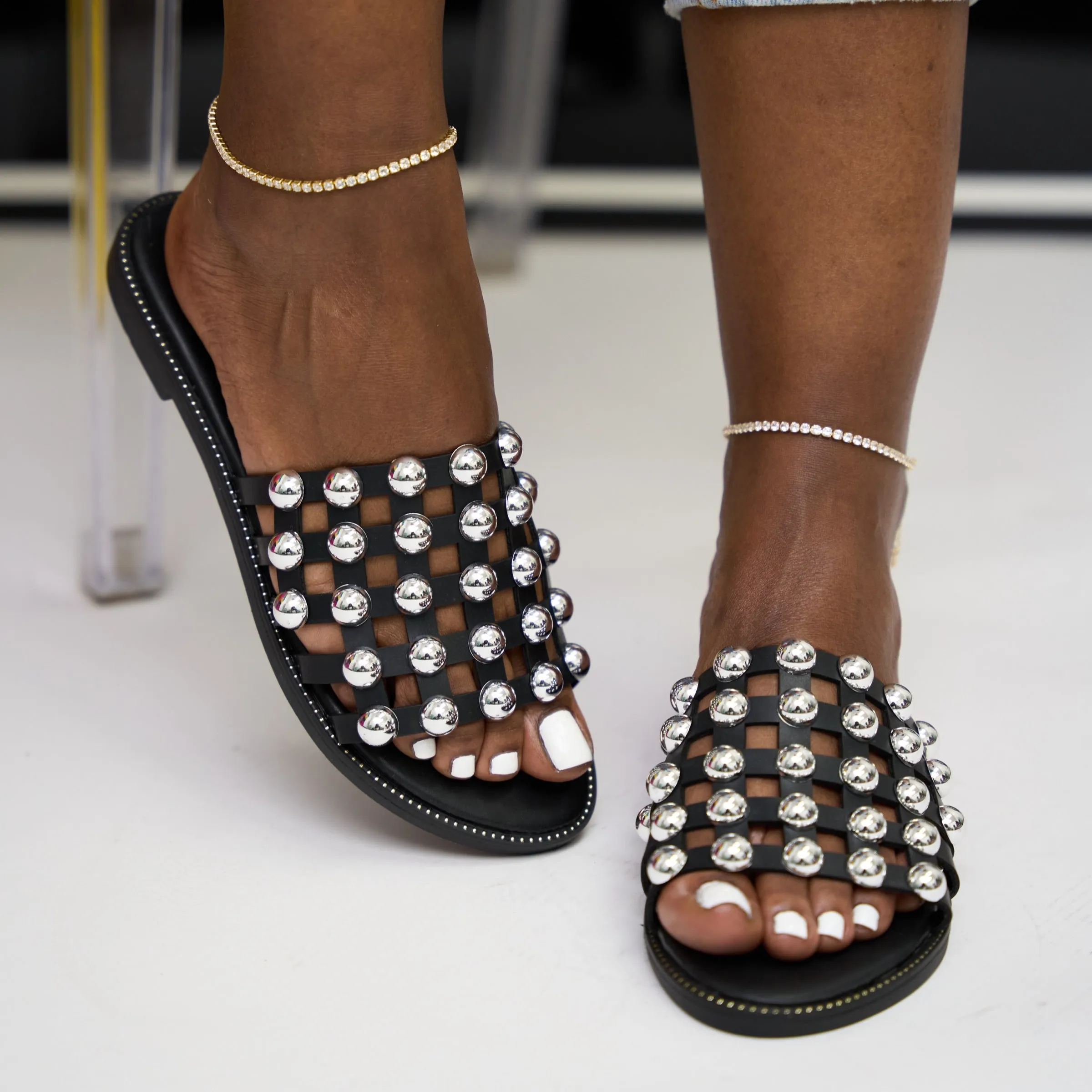 Stylish black studded slide sandals - Jolene